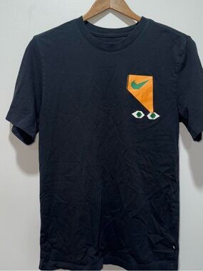 Nike black tee with colorful graphic design. Size: S